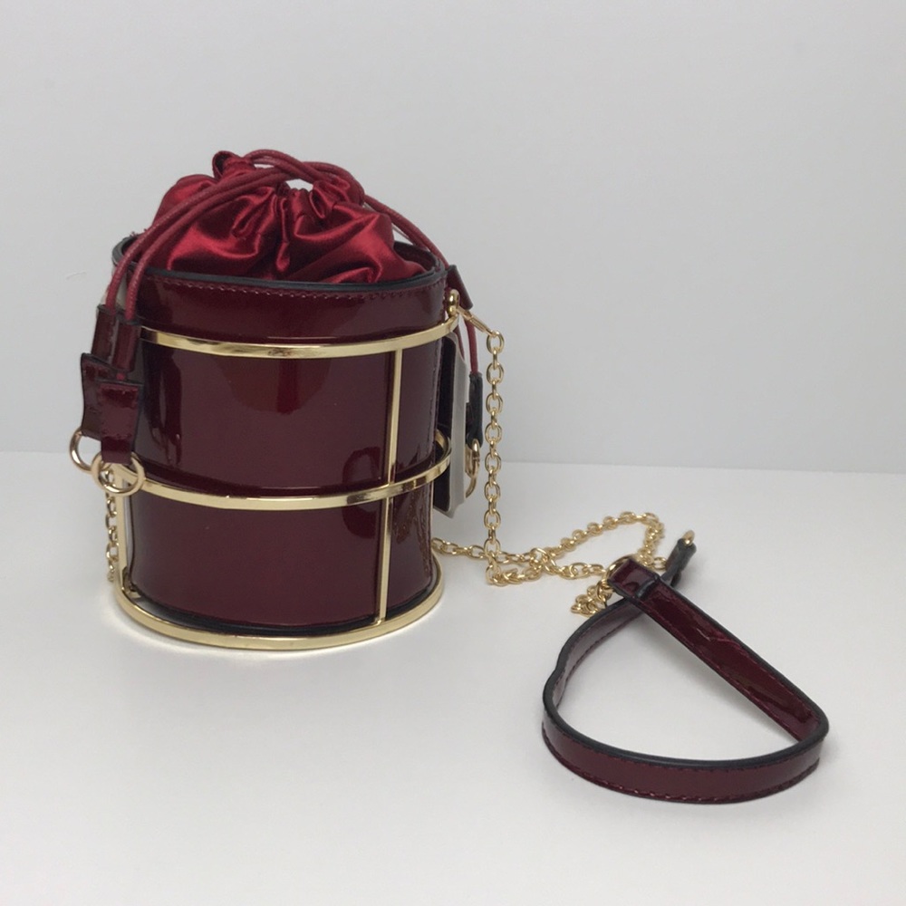 Unique Burgundy Bucket Bag With Gold Detailing
